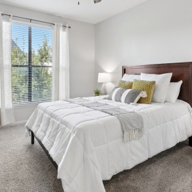 Bedroom with natural light and ceiling fan Bedroom with natural light and ceiling fan